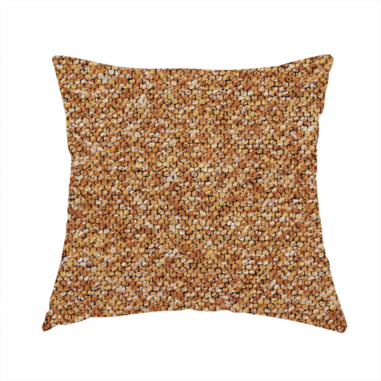 The fabric used to create this handmade cushion is a rich mustard yellow and dark brown textured upholstery fabric.