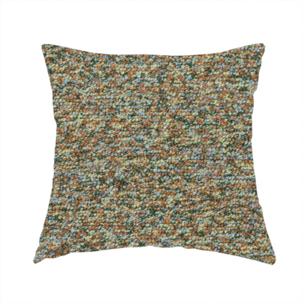 The fabric used to create this handmade cushion is a earthy blend of forest green, terracotta, and grey textured upholstery fabric.