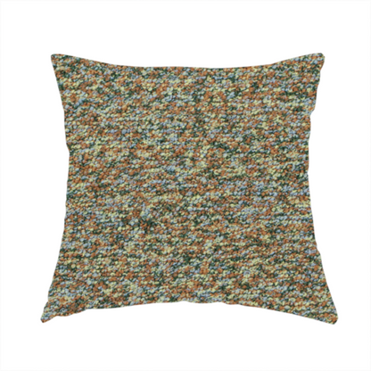 The fabric used to create this handmade cushion is a earthy blend of forest green, terracotta, and grey textured upholstery fabric.