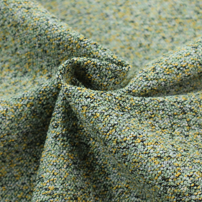 A high-contrast lime green, dark green, and yellow textured upholstery fabric.