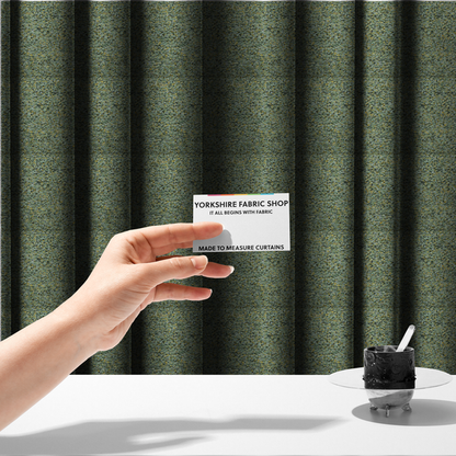 The fabric used to create these made-to-measure curtains is a high-contrast lime green, dark green, and yellow textured upholstery fabric.