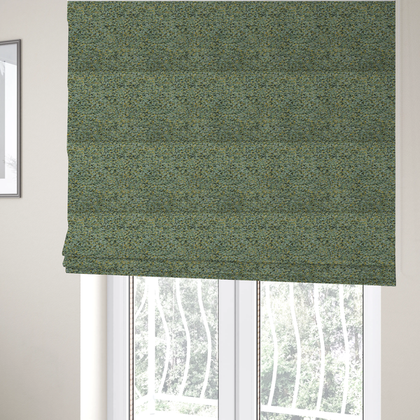The fabric used to create these Roman blinds is a high-contrast lime green, dark green, and yellow textured upholstery fabric.