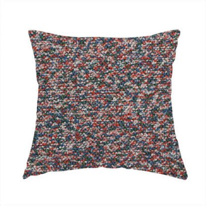 The fabric used to create this handmade cushion is a multi-coloured textured upholstery fabric, featuring a blend of red, blue, green, and white fibres.