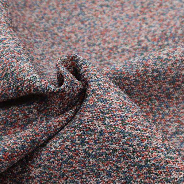 A multi-coloured textured upholstery fabric, featuring a blend of red, blue, green, and white fibres.