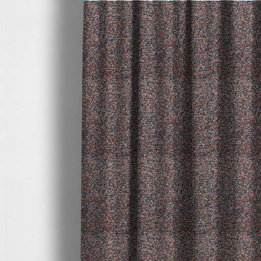 The fabric used to create these made-to-measure curtains is a multi-coloured textured upholstery fabric, featuring a blend of red, blue, green, and white fibres.
