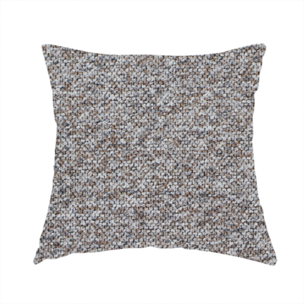 The fabric used to create this handmade cushion is a dark charcoal and slate grey fabric with a dense, nubby weave. The heavy-duty, multi-tonal texture suggests a durable, high-quality material for furniture upholstery.