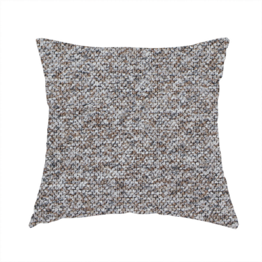 The fabric used to create this handmade cushion is a dark charcoal and slate grey fabric with a dense, nubby weave. The heavy-duty, multi-tonal texture suggests a durable, high-quality material for furniture upholstery.
