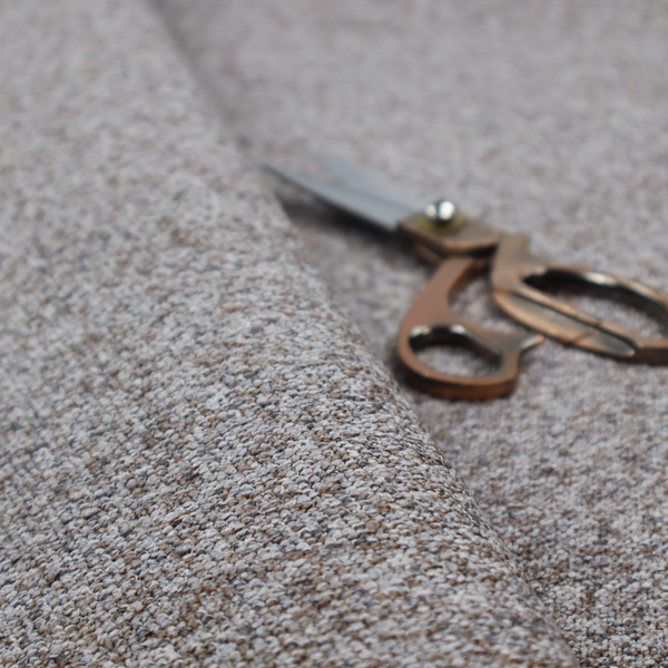 A dark charcoal and slate grey fabric with a dense, nubby weave. The heavy-duty, multi-tonal texture suggests a durable, high-quality material for furniture upholstery.