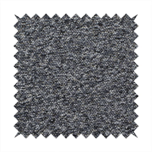 A textured, nubby fabric surface in shades of charcoal, slate, and light grey. The speckled pattern suggests a durable, tightly woven material, ideal for upholstery.
