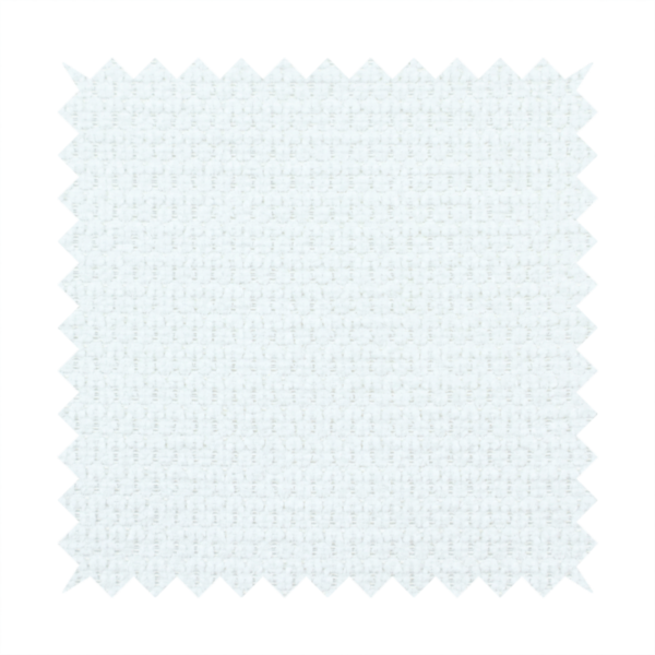 A white, textured fabric with a dense, rhythmic pattern. The material features a honeycomb or waffle-weave structure, where small, uniform raised circles create a grid-like tactile surface. The colour is a bright, cool-toned white, and the subtle shadows within the weave give the fabric a soft, multidimensional appearance.