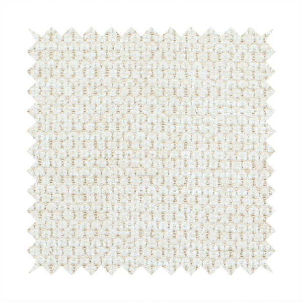 A warm cream or off-white tone. The material features a chunky, heavyweight weave with a distinct dimensional grid. The texture is composed of thick, interlaced threads that create a series of small, raised rectangular bumps, giving it a basket weave or bouclé-like appearance.