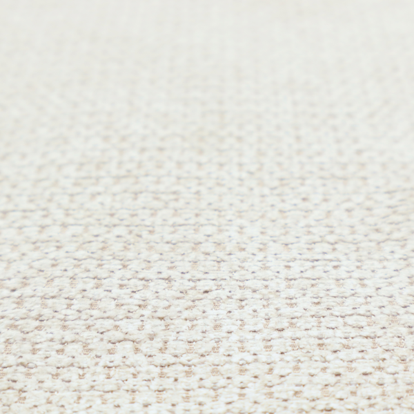 A warm cream or off-white tone. The material features a chunky, heavyweight weave with a distinct dimensional grid. The texture is composed of thick, interlaced threads that create a series of small, raised rectangular bumps, giving it a basket weave or bouclé-like appearance.