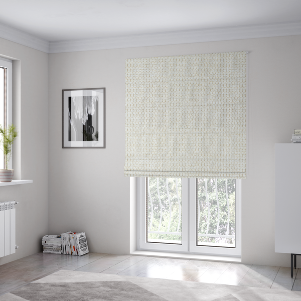 The fabric used to create these Roman blinds is a warm cream or off-white tone. The material features a chunky, heavyweight weave with a distinct dimensional grid. The texture is composed of thick, interlaced threads that create a series of small, raised rectangular bumps, giving it a basket weave or bouclé-like appearance.