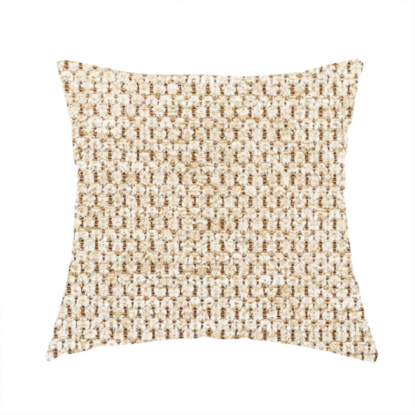 The fabric used to create this handmade cushion is a textured, multi-tonal beige and tan fabric. The material features a tight, intricate weave that creates a pebbled or "seed stitch" appearance. The colour is a warm sand or wheat palette, achieved by interlacing light cream threads with darker tan or straw-coloured fibres, giving the fabric a rich, organic depth.