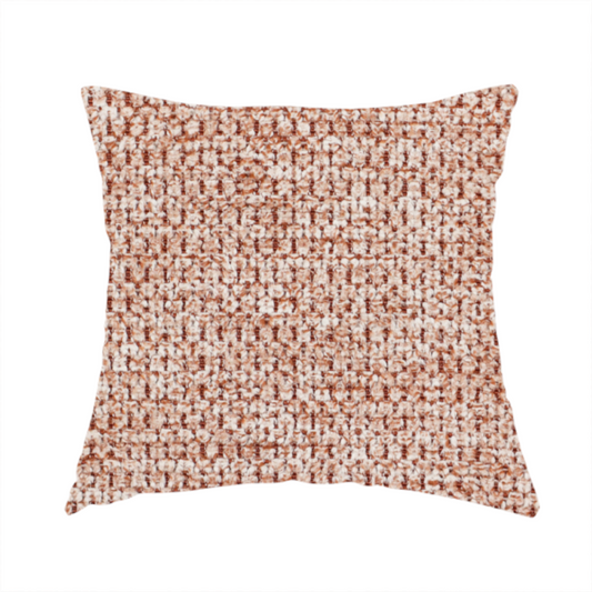 The fabric used to create this handmade cushion is a textured, multi-tonal terracotta and cream fabric. The material features a dense, rhythmic weave that creates a speckled or "salt and pepper" effect. The colour is a warm, earthy copper palette, achieved by blending burnt orange or clay-coloured threads with lighter off-white fibres for a rich, weathered appearance.