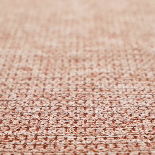 A textured, multi-tonal terracotta and cream fabric. The material features a dense, rhythmic weave that creates a speckled or "salt and pepper" effect. The colour is a warm, earthy copper palette, achieved by blending burnt orange or clay-coloured threads with lighter off-white fibres for a rich, weathered appearance.