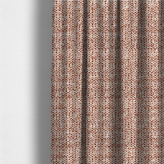 The fabric used to create these made-to-measure curtains is a textured, multi-tonal terracotta and cream fabric. The material features a dense, rhythmic weave that creates a speckled or "salt and pepper" effect. The colour is a warm, earthy copper palette, achieved by blending burnt orange or clay-coloured threads with lighter off-white fibres for a rich, weathered appearance.