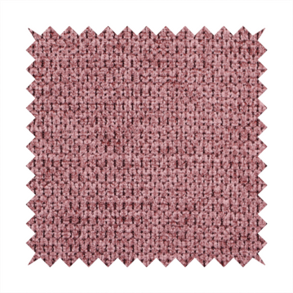 A textured fabric in a deep dusty rose or muted berry tone. The material features a tight, uniform weave with a distinct honeycomb-like structure. The colour is a rich, cool-toned mauve, achieved by blending darker plum threads with lighter pink fibres, creating a subtle weathered effect that adds depth and sophistication.