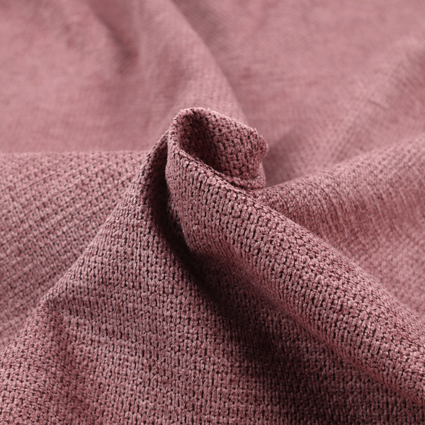 A textured fabric in a deep dusty rose or muted berry tone. The material features a tight, uniform weave with a distinct honeycomb-like structure. The colour is a rich, cool-toned mauve, achieved by blending darker plum threads with lighter pink fibres, creating a subtle weathered effect that adds depth and sophistication.