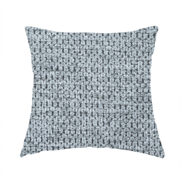 The fabric used to create this handmade cushion is a cool-toned, silver-grey weave with subtle dark lowlights.