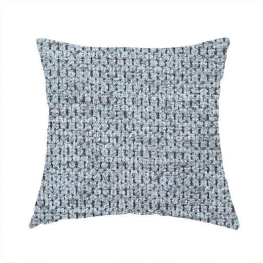 The fabric used to create this handmade cushion is a cool-toned, silver-grey weave with subtle dark lowlights.