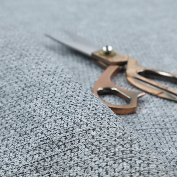 A cool-toned, silver-grey weave with subtle dark lowlights.