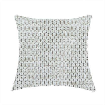 The fabric used to create this handmade cushion is a textured fabric in light greige or pale oatmeal. The material features a dense, rhythmic honeycomb weave. The colour is achieved by interlacing light cream threads with cool grey base fibres, creating a neutral, stony appearance with a soft, pebbled tactile surface.