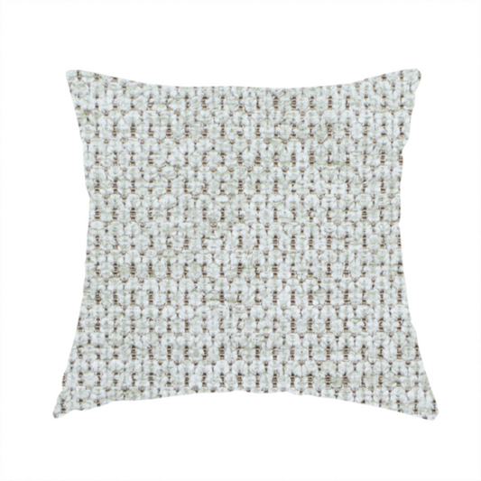 The fabric used to create this handmade cushion is a textured fabric in light greige or pale oatmeal. The material features a dense, rhythmic honeycomb weave. The colour is achieved by interlacing light cream threads with cool grey base fibres, creating a neutral, stony appearance with a soft, pebbled tactile surface.