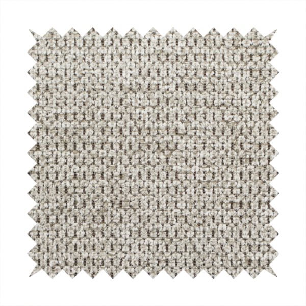A textured fabric in a warm stone or soft taupe tone. This material features the collection's signature dense, rhythmic honeycomb weave. The colour is a sophisticated neutral mushroom, achieved by interlacing light cream and flax-coloured threads over a darker tan base, creating a grainy, organic depth that feels both earthy and modern.