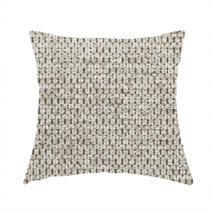 The fabric used to create this handmade cushion is a textured fabric in a warm stone or soft taupe tone. This material features the collection's signature dense, rhythmic honeycomb weave. The colour is a sophisticated neutral mushroom, achieved by interlacing light cream and flax-coloured threads over a darker tan base, creating a grainy, organic depth that feels both earthy and modern.