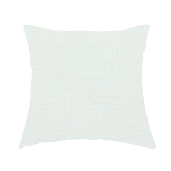 The fabric used to create these handmade cushions is a pale off-white or cream-colored fabric featuring a fine, subtle grid-like texture. The weave consists of horizontal and vertical threads that create a soft, matte finish with a minimalist, clean aesthetic.