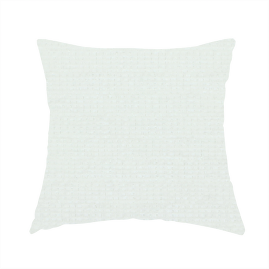 The fabric used to create these handmade cushions is a pale off-white or cream-colored fabric featuring a fine, subtle grid-like texture. The weave consists of horizontal and vertical threads that create a soft, matte finish with a minimalist, clean aesthetic.