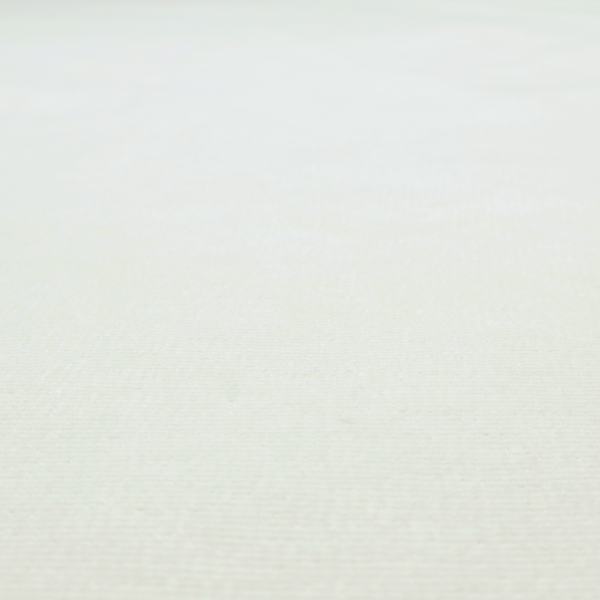 A pale off-white or cream-colored fabric featuring a fine, subtle grid-like texture. The weave consists of horizontal and vertical threads that create a soft, matte finish with a minimalist, clean aesthetic.