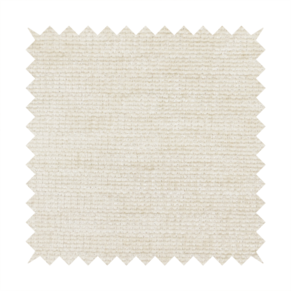 A warm beige or oatmeal-coloured fabric featuring a dense, horizontal corded texture. The weave has a soft, chenille-like appearance with closely packed raised lines, creating a cosy and high-tactile surface.