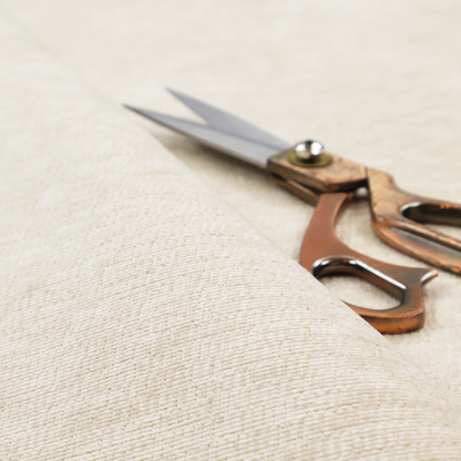 A warm beige or oatmeal-coloured fabric featuring a dense, horizontal corded texture. The weave has a soft, chenille-like appearance with closely packed raised lines, creating a cosy and high-tactile surface.