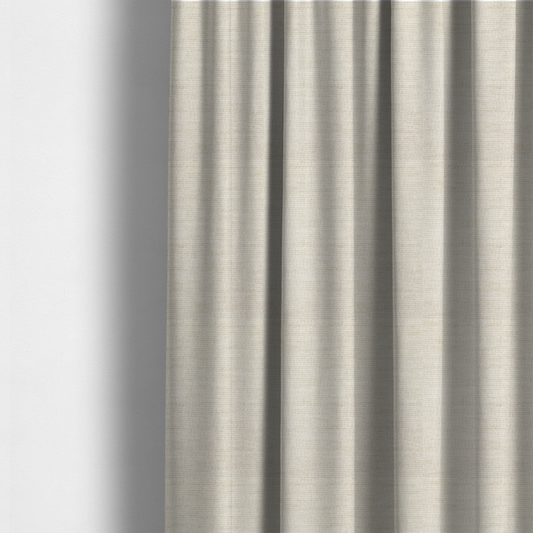 The fabric used to create these made-to-measure curtains is a warm beige or oatmeal-coloured fabric featuring a dense, horizontal corded texture. The weave has a soft, chenille-like appearance with closely packed raised lines, creating a cosy and high-tactile surface.