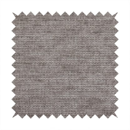 A taupe or ash brown fabric with a dense, horizontal ribbed texture. The material features a soft, velvety pile that creates subtle light-catching highlights and shadows across the linear weave.