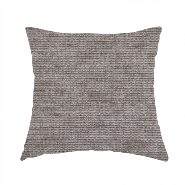 The fabric used to create this handmade cushion is a taupe or ash brown fabric with a dense, horizontal ribbed texture. The material features a soft, velvety pile that creates subtle light-catching highlights and shadows across the linear weave.