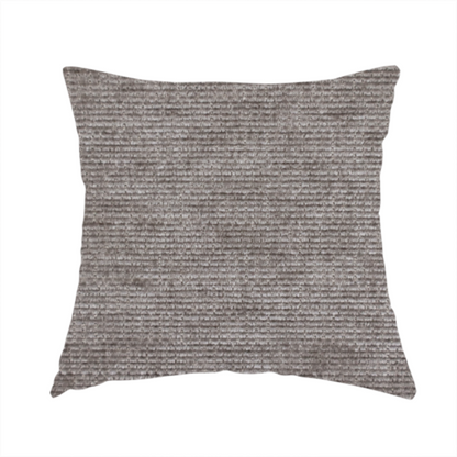 The fabric used to create this handmade cushion is a taupe or ash brown fabric with a dense, horizontal ribbed texture. The material features a soft, velvety pile that creates subtle light-catching highlights and shadows across the linear weave.
