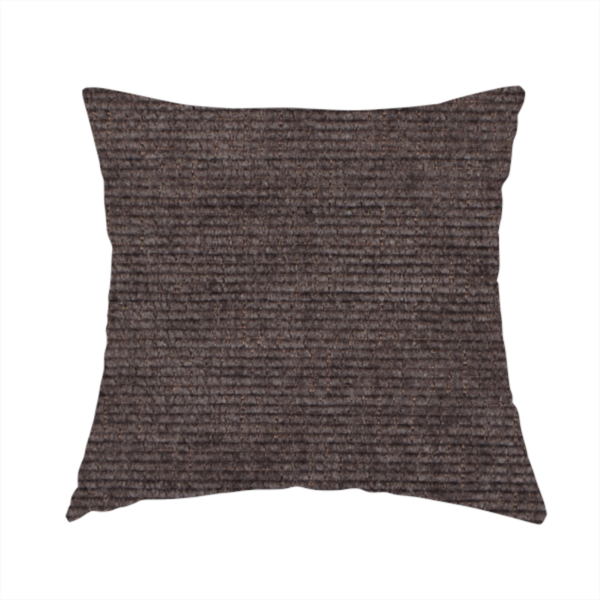 The fabric used to create this handmade cushion is a deep charcoal or cocoa-brown fabric with a heavy horizontal corded texture. The dense, linear weave creates a multi-tonal effect with subtle shadows, offering a sophisticated and cosy tactile appearance.