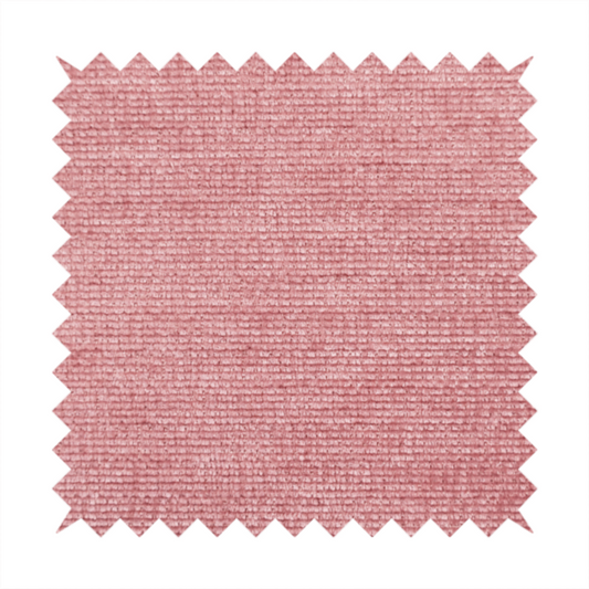 A vibrant mauve-pink or raspberry-toned fabric featuring a dense, horizontal corded texture. The soft, plush weave creates a uniform linear pattern with a subtle velvety sheen that catches the light along each ridge.