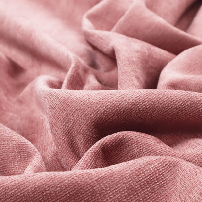 A vibrant mauve-pink or raspberry-toned fabric featuring a dense, horizontal corded texture. The soft, plush weave creates a uniform linear pattern with a subtle velvety sheen that catches the light along each ridge.