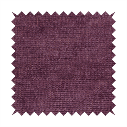 A deep plum or dark berry purple fabric with a rich, textured weave. It features a subtle horizontal grain combined with a soft, mottled pile that creates depth through varying shades of purple and wine, resulting in a plush and sophisticated finish.