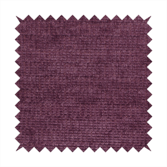 A deep plum or dark berry purple fabric with a rich, textured weave. It features a subtle horizontal grain combined with a soft, mottled pile that creates depth through varying shades of purple and wine, resulting in a plush and sophisticated finish.