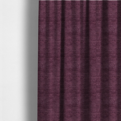 The fabric used to create these made-to-measure curtains is a deep plum or dark berry purple fabric with a rich, textured weave. It features a subtle horizontal grain combined with a soft, mottled pile that creates depth through varying shades of purple and wine, resulting in a plush and sophisticated finish.