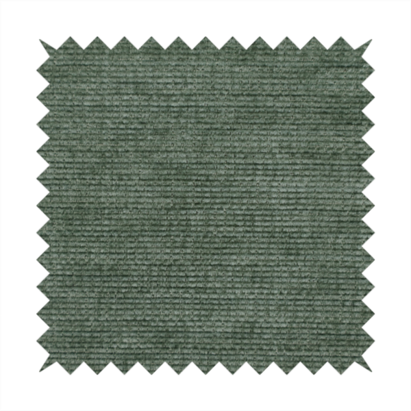 A forest green fabric with a dense horizontal ribbed texture. The weave features a soft, velvety pile that creates a subtle play of light and shadow across the linear ridges, giving the material a rich, organic feel.