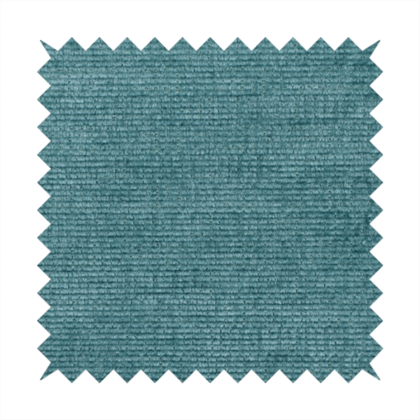 A deep peacock blue fabric with a structured horizontal corded texture. The plush, velvety ridges create a dense linear pattern, offering a sophisticated play of light and shadow with a soft, durable finish.