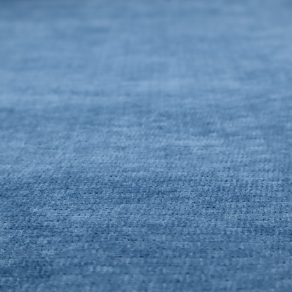 A vibrant mid-blue or cornflower blue fabric featuring a dense horizontal corded texture. The weave has a soft, plush finish with a subtle velvety sheen that creates light-catching highlights across the uniform linear ridges.