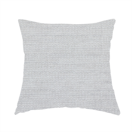 The fabric used to create this handmade cushion is a light grey fabric with a soft, uniform horizontal ribbed texture. The weave has a plush, velvety pile that creates subtle shadows and highlights across the linear ridges, providing a clean, modern aesthetic with a tactile feel.