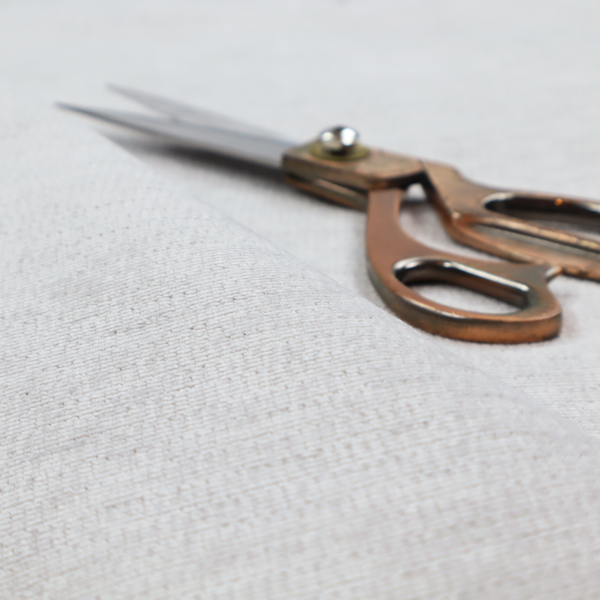 A light grey fabric with a soft, uniform horizontal ribbed texture. The weave has a plush, velvety pile that creates subtle shadows and highlights across the linear ridges, providing a clean, modern aesthetic with a tactile feel.